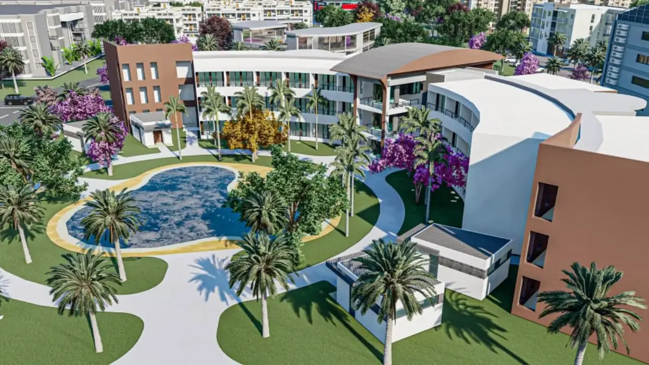 Closer aerial view of a landscaped water garden and curved building in the Chinhoyi CBD concept model